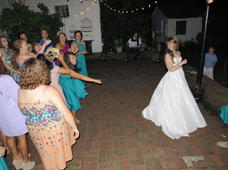 Tossing the bouquet. 