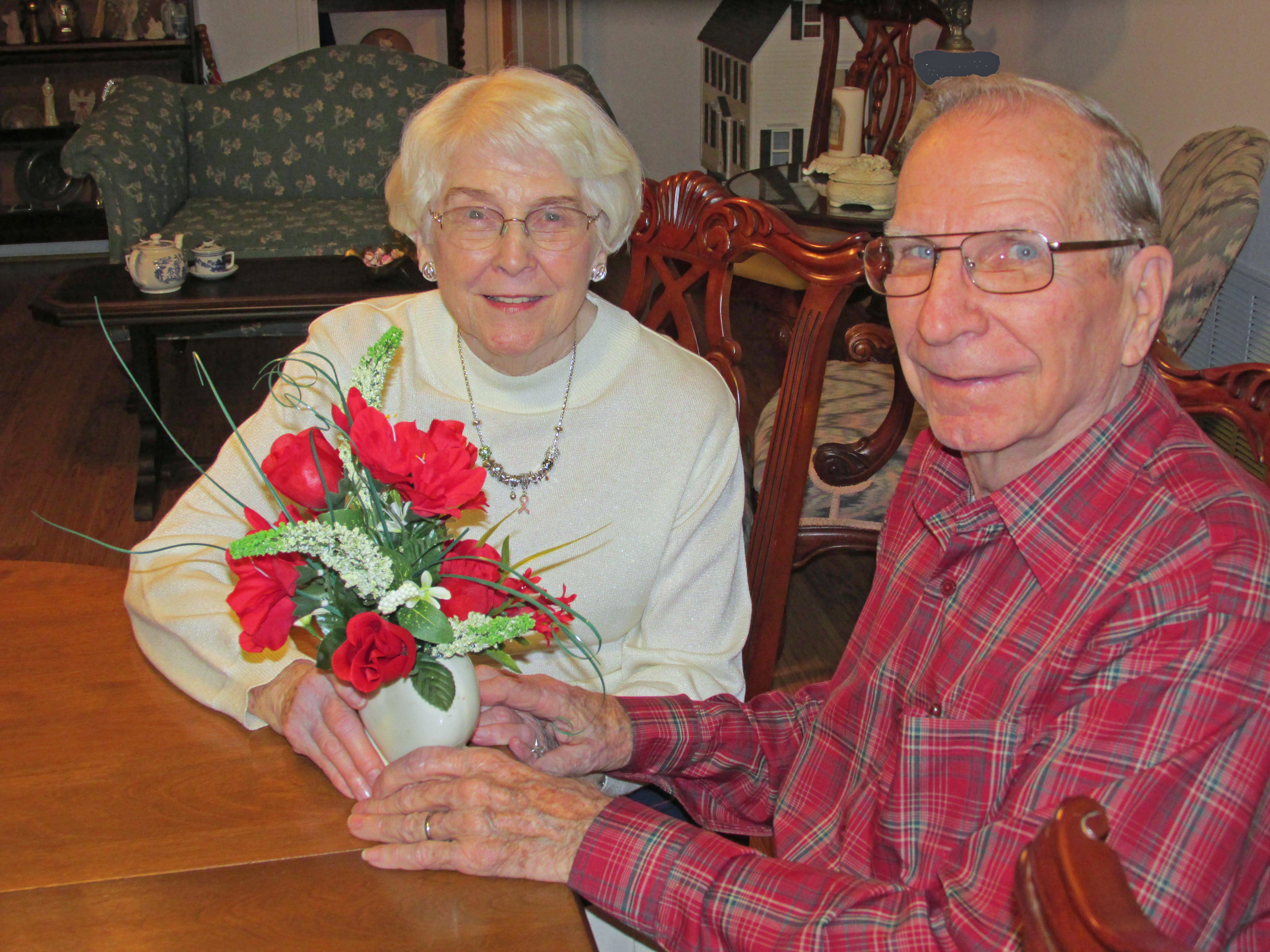 JC and Elsie with vase